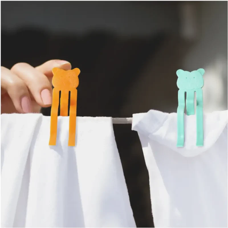 pinzas para tender una mano